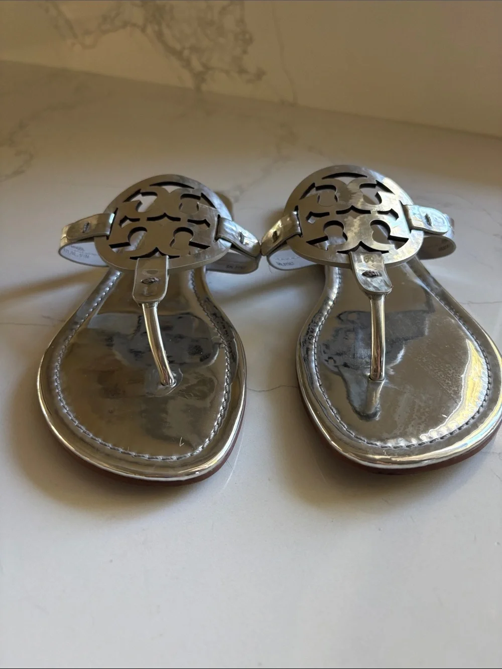 Tory Burch Women’s Metallic Silver Thong Sandals with Logo Medallion size 9.5